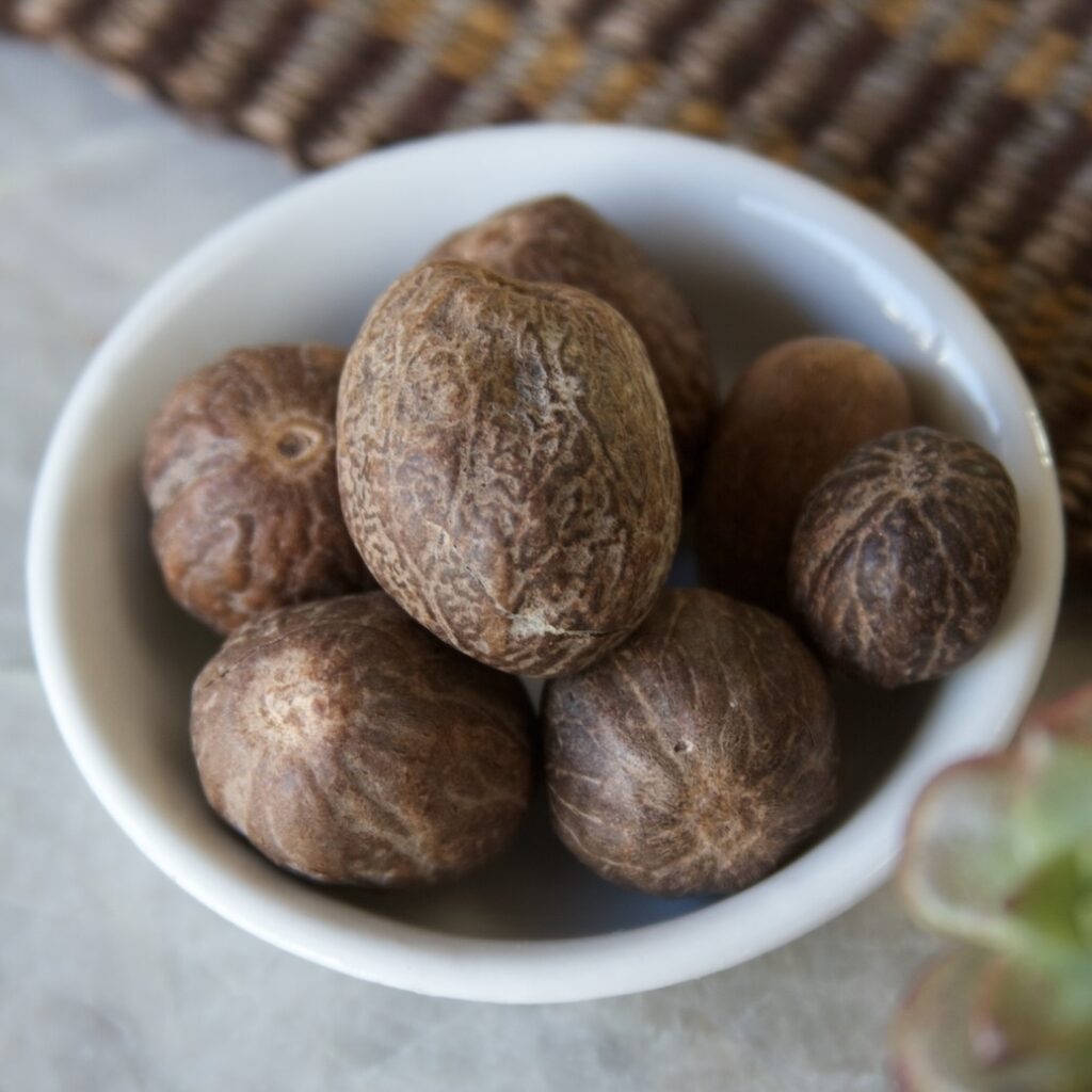 Nutmeg seeds in bowl