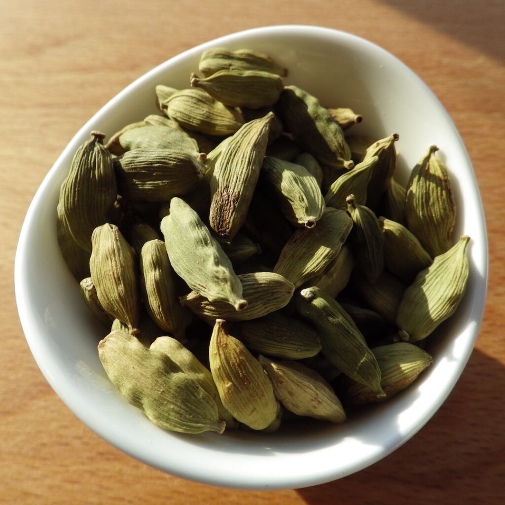 Green Cardamom in white bowl