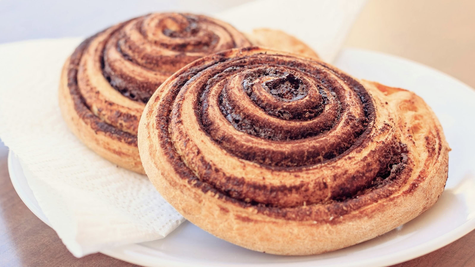Cinnamon rolls on a white plate