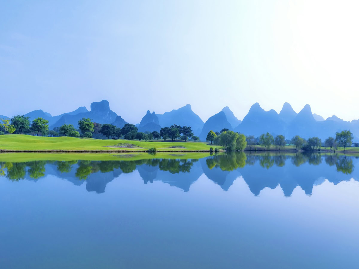 Guangxi, Southwest China—a lake and mountains reflected in the water