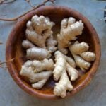 5 ginger rhizomes in a beautiful wooden bowl