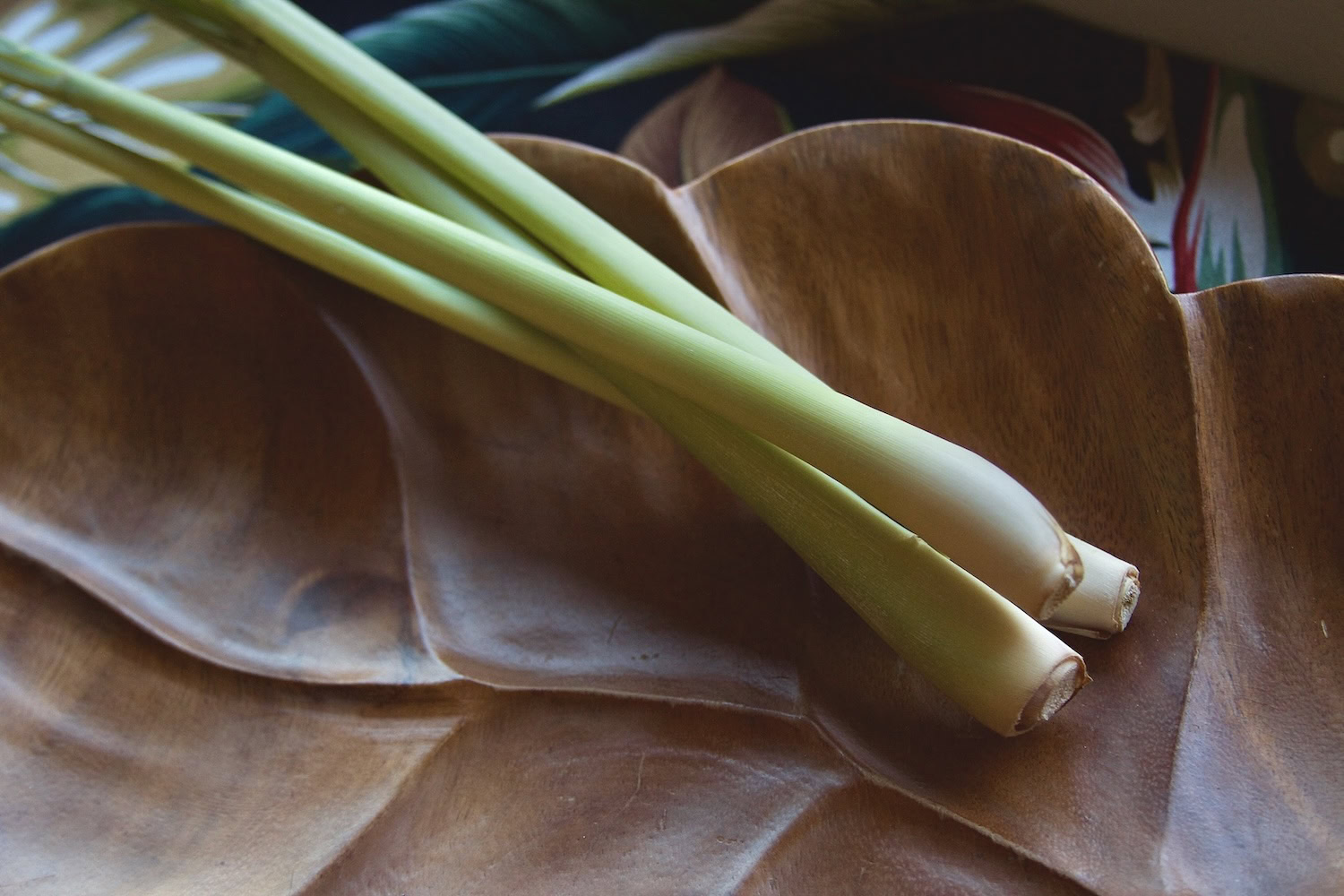 Lemongrass stalks in a leaf-shaped bowl