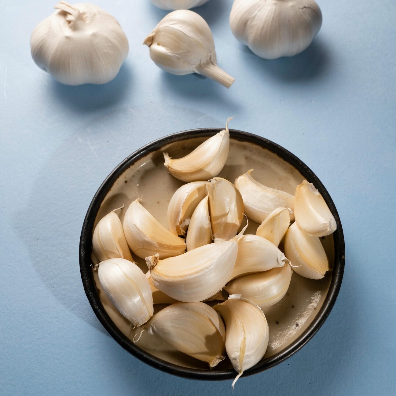 Garlic cloves in bowl