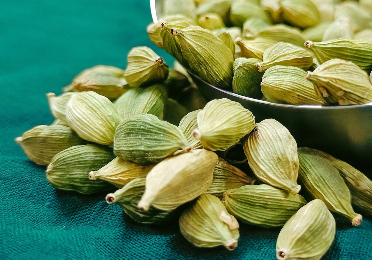 Green cardamom on cloth