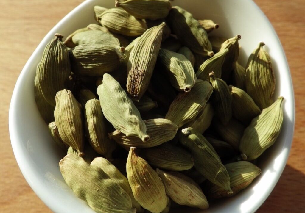 Green Cardamom in white bowl