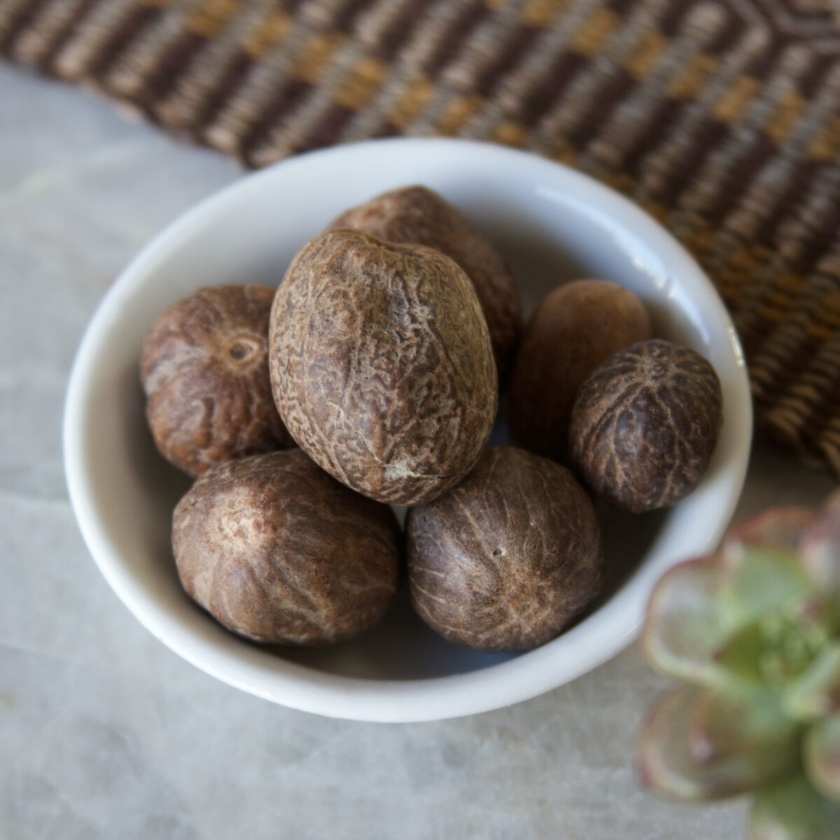 Nutmeg seeds in bowl