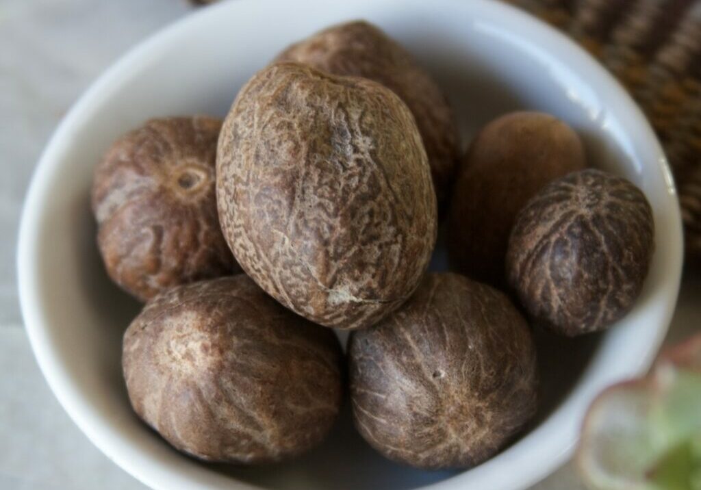 Nutmeg seeds in bowl